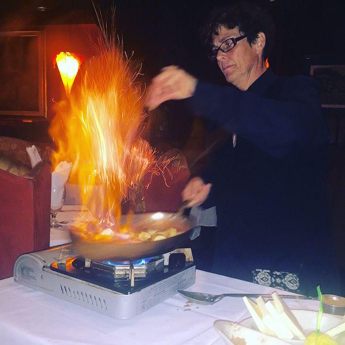 Bananas foster being prepared table side