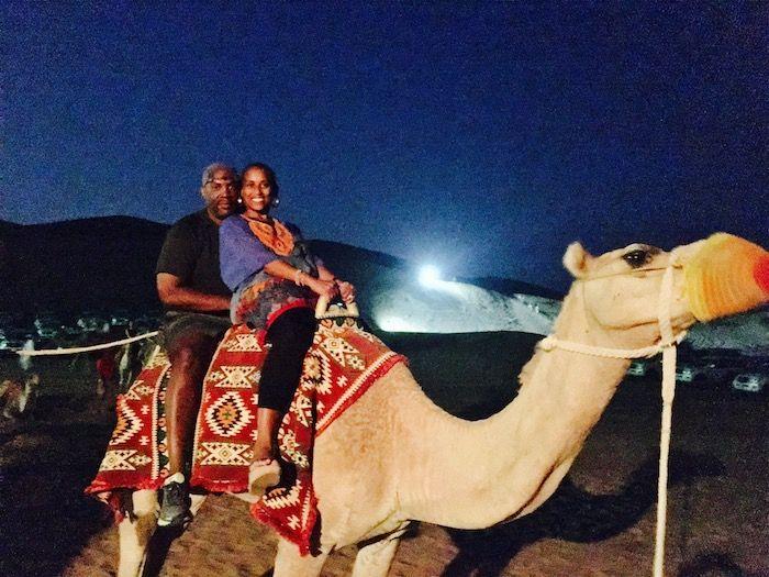 couple on camel at night