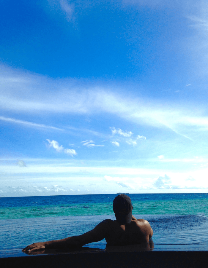 man looking out at ocean