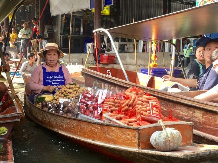 sausage seller in boat