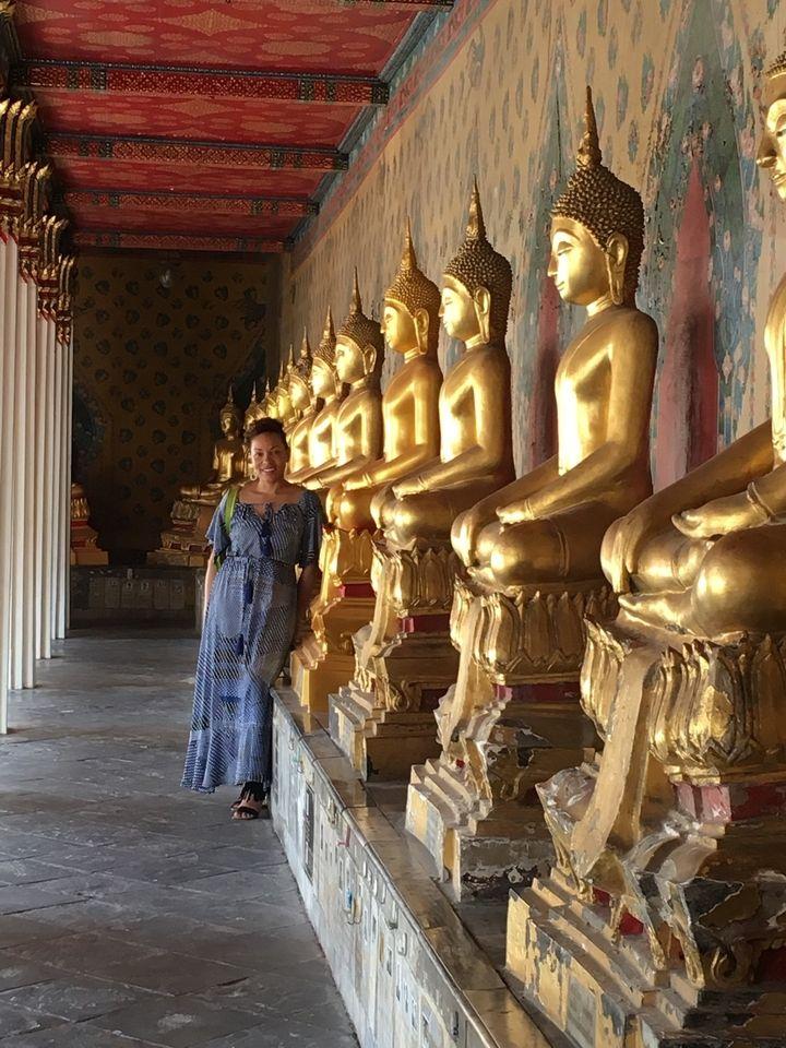 row of golden statues at Wat Arun-Temple of the Dawn