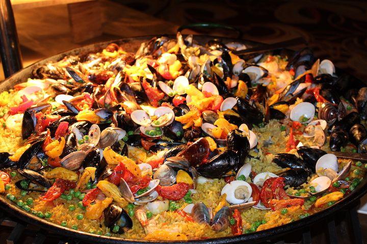 a dish of paella at The Crown Room