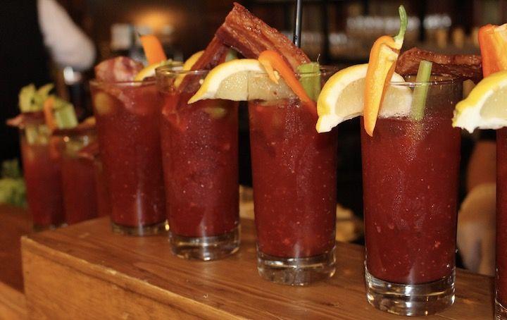 a row of Bloody Mary drinks at The Crown Room