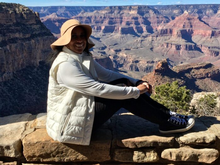 the author sitting overlooking the South Rim of the Grand Canyon