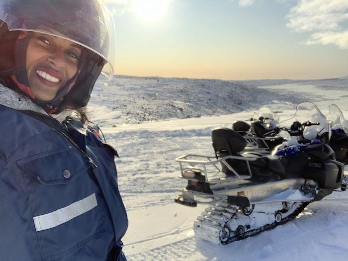 the author with a snowmobile