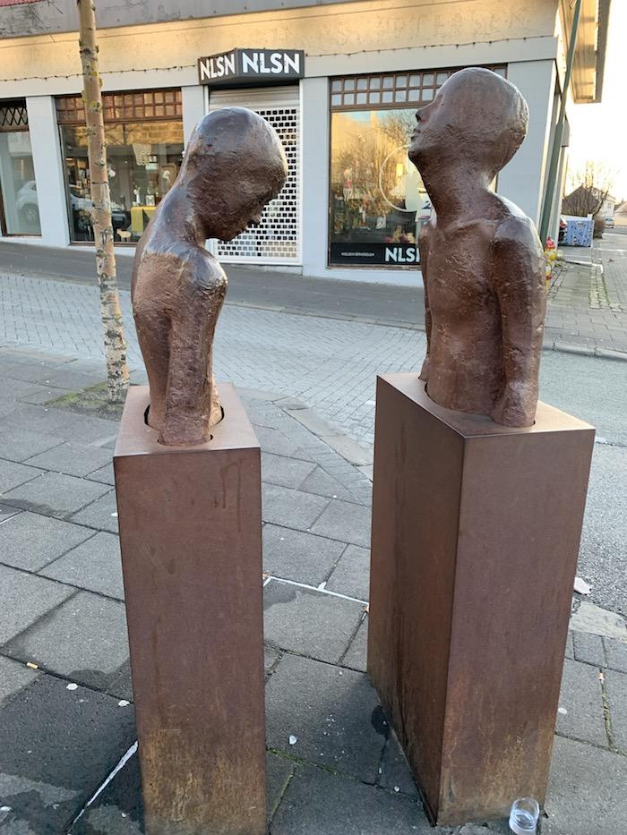 Sculptures of two people in Reykjavik