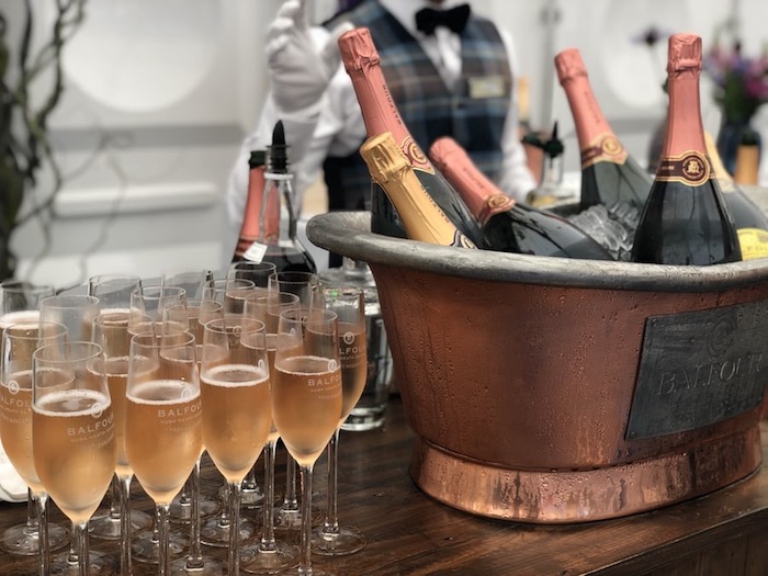 bottles of rosé wine in an ice bucket