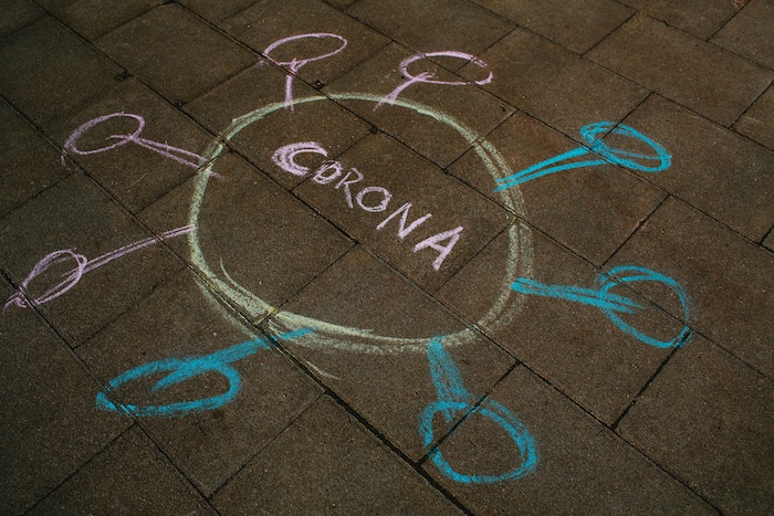 chalk drawing of coronavirus