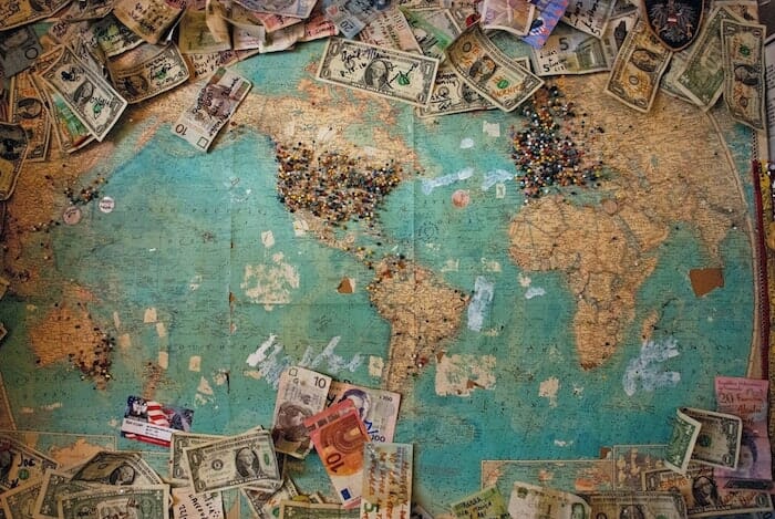 map covered in different currency