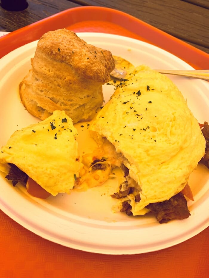 Bacon tomato and pimento cheese omelet and a fluffy biscuit at Sunny Point Cafe