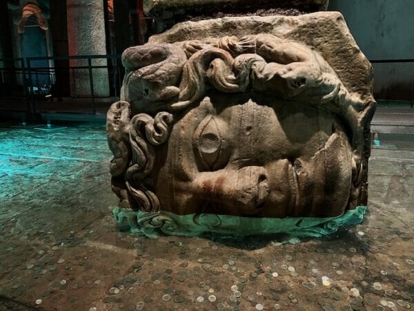 Medusa head in water at the basilica cistern